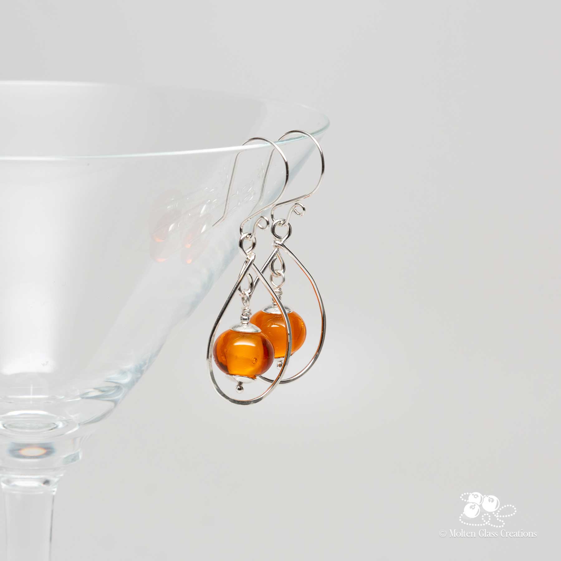 glass & silver teardrop earrings - amber