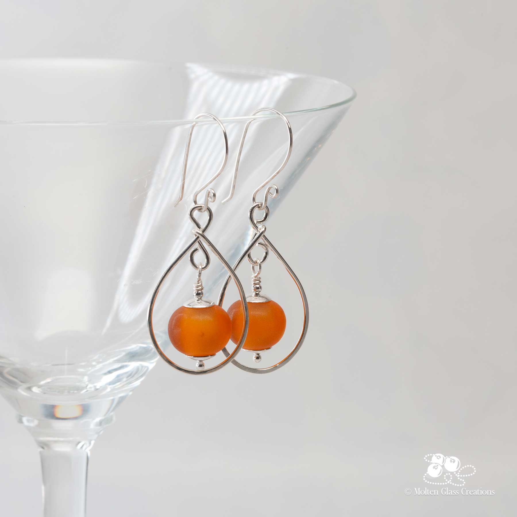 glass & silver teardrop earrings - amber