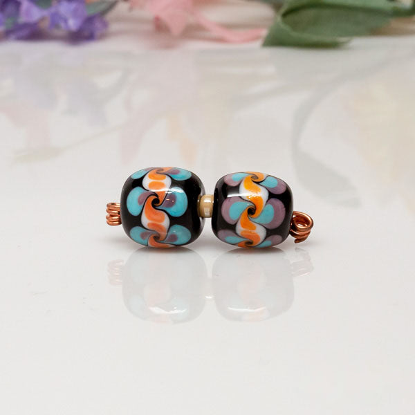 blue, orange, purple barrel bead set